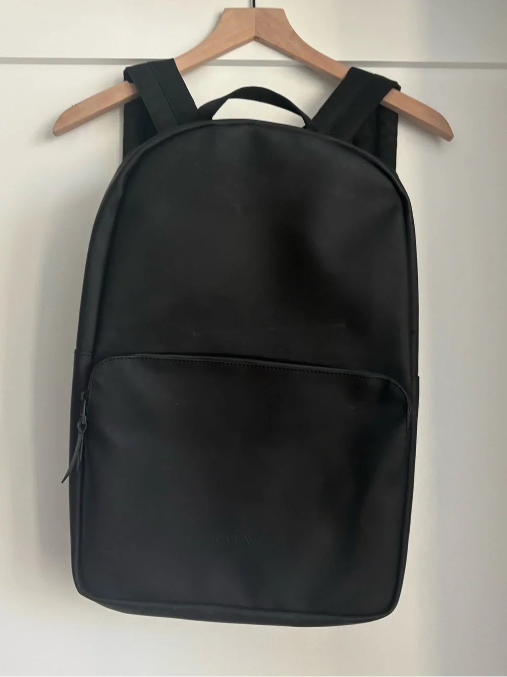 Rains sleek backpack